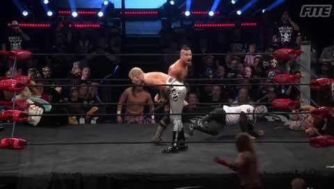 Marty Scurll nails Cody with the umbrella Marty Scurll nails Cody with the umbrella